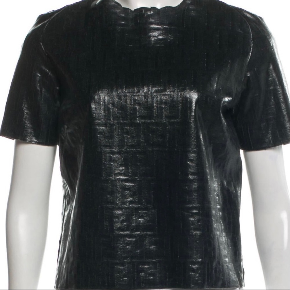 Black Fendi top with textured logo print throughout. Crew neck, short sleeves.